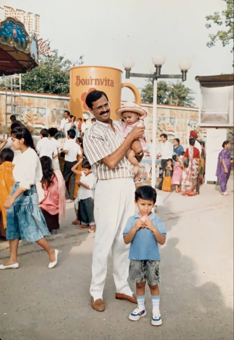 Dad with Meethi and me at Appu Ghar, Delhi's most popular amusement park at the time. (Early 1990s)